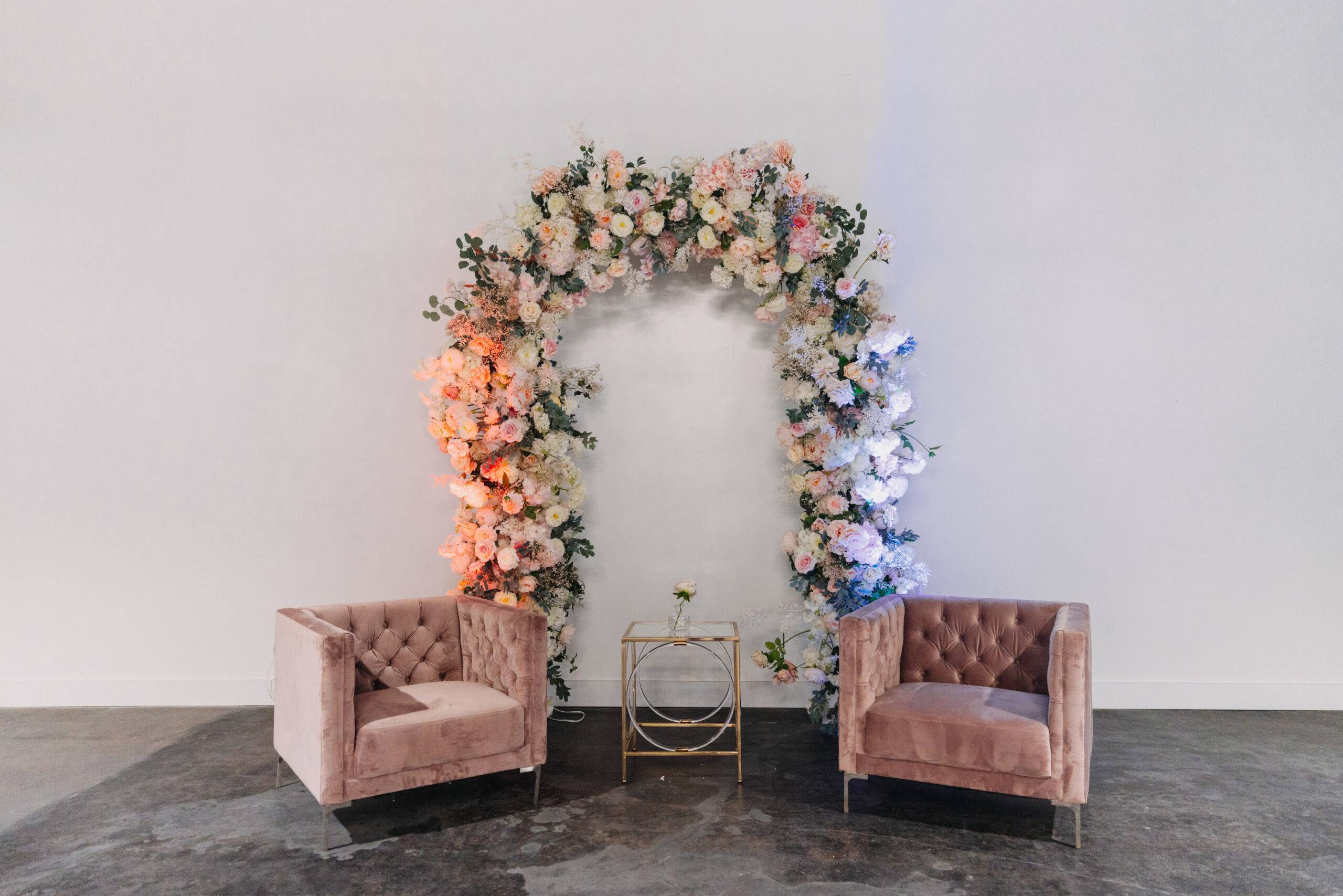 Pink floral arch at Copacabana Hall
